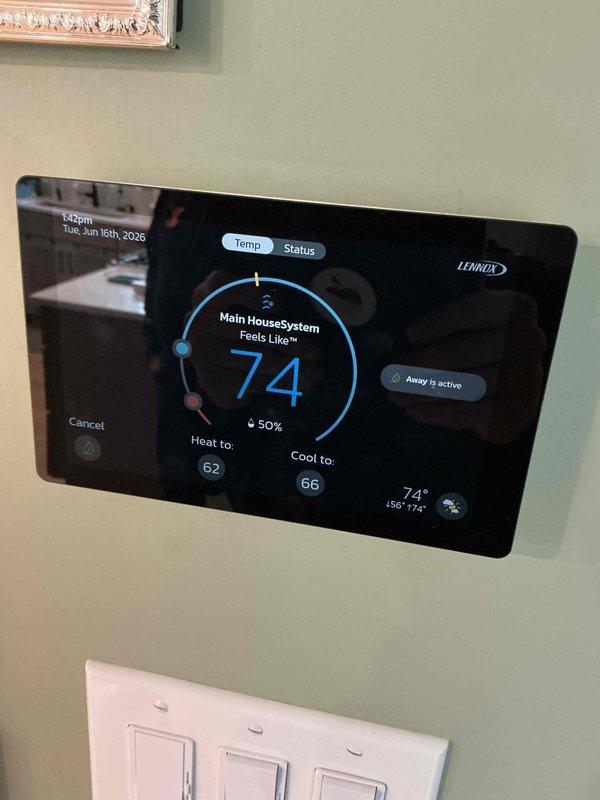 Completed comprehensive BFMA tune-up on Lennox HVAC system serving main house zone. Performed standard maintenance protocol including inspection of thermostat operation, verified system settings with heating setpoint at 62°F and cooling setpoint at 66°F, confirmed Away mode functionality. Inspected interior cabinet components and noted debris accumulation in bottom corner of unit housing, which is typical for equipment age 1+ years. System operating within normal parameters at time of service.
