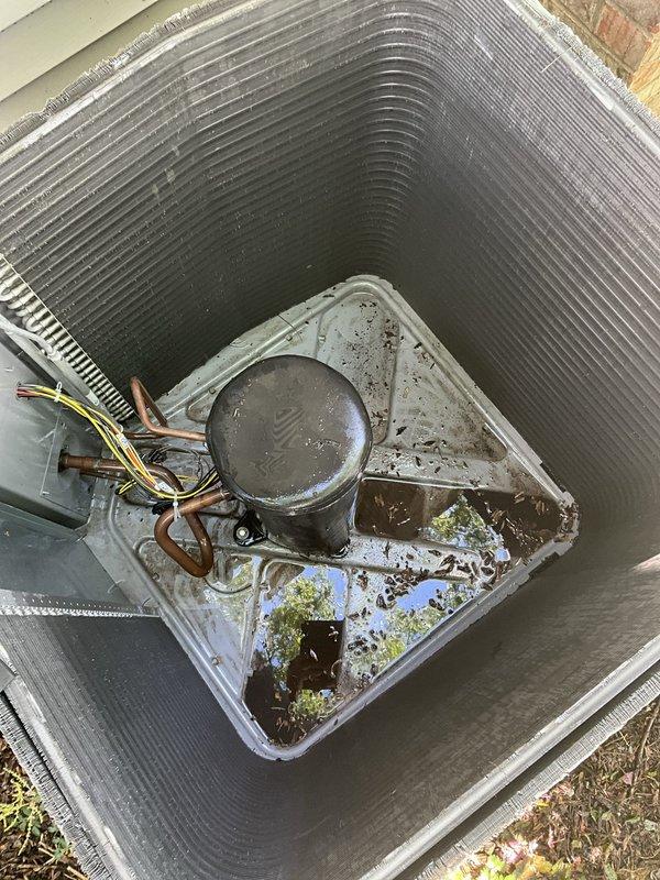 Completed comprehensive BFMA tune-up service on 7+ year old residential air conditioning system. Performed standard maintenance procedures including inspection of condenser unit, evaporator coil, and all system components. Documented significant moisture accumulation and biological growth in condensate drain pan, along with rust and corrosion on base plate requiring future attention to prevent drainage issues and potential system damage.
