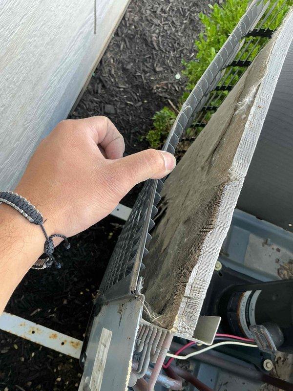 Completed comprehensive BFMA tune-up service on 11+ year old HVAC system, including full AC maintenance and dryer vent cleaning. Removed and cleaned heavily soiled air filter and protective louvered grate, which showed significant accumulation of dirt, dust, and debris that was restricting airflow and reducing system efficiency. Inspected condenser coils, fins, motor assembly, and electrical connections; all components were serviced and unit restored to optimal operating condition.