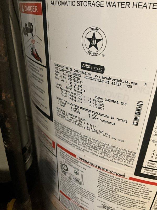 Responded to service call for unusual noise coming from 5-year-old Bradford White 40-gallon natural gas water heater. Upon inspection, performed diagnostic assessment of unit including examination of burner assembly, gas valve operation, and sediment accumulation in tank. Identified noise source as sediment buildup on tank bottom causing popping and rumbling sounds during heating cycles. Verified all safety controls, temperature and pressure relief valve, gas connections, and venting system were functioning properly with no leaks detected. Documented unit specifications and current operating condition with photos. Recommended tank flushing procedure to remove mineral deposits and restore quiet operation, with ongoing maintenance schedule to prevent future sediment accumulation.