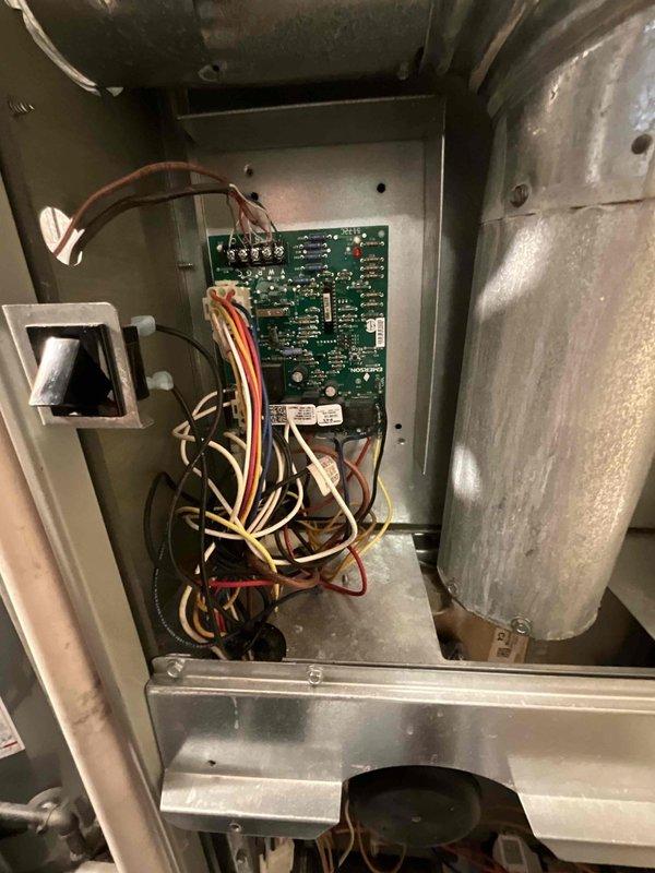 Completed comprehensive BFMA tune-up on 9+ year old HVAC system. Performed standard AC maintenance procedures including inspection of indoor air handler with control board and blower assembly, verified all electrical connections and wiring harnesses were secure. Outdoor condenser unit required extensive attention due to severely deteriorated condition with top cover removed, heavy debris accumulation, and significant biological growth on condenser coil. Addressed standing water issue around concrete pad and cleaned accessible components. Provided homeowner instruction on proper air filter replacement procedures and demonstrated correct filter changing technique. System evaluated for age-appropriate wear and operational concerns documented for future reference.