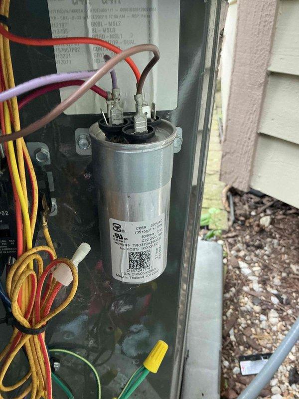 Completed comprehensive BFMA tune-up service on residential HVAC system, including air conditioning inspection and filter replacement. Performed electrical diagnostics on outdoor unit, testing capacitor functionality and verifying proper voltage readings at 498V, inspecting all wire connections and terminals within the control panel for secure contact and proper operation. All components found operating within normal parameters, system tested and confirmed cooling effectively.