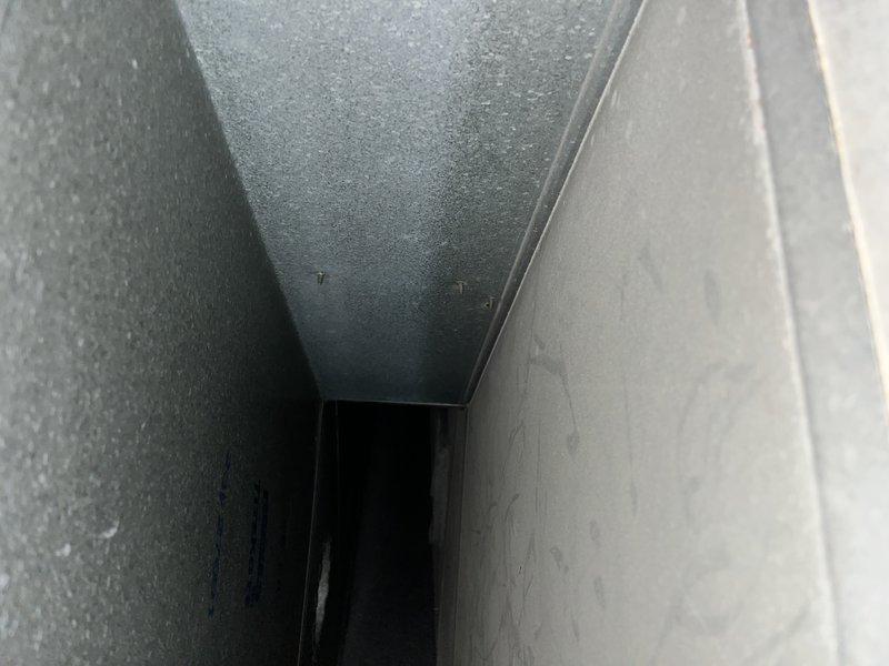 Completed comprehensive duct cleaning service for 2,500 square foot residential system. Accessed and cleaned interior ductwork throughout the home, removing accumulated dust, debris, and moisture from all accessible supply and return air passages. Documented pre-service conditions showing moisture accumulation on duct surfaces and verified thorough cleaning of all components to restore optimal airflow and indoor air quality.