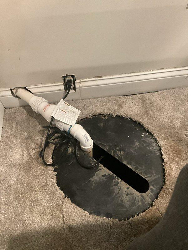 Conducted on-site assessment for sump pump installation in residential property. Customer expressed interest in Water Commander system with battery backup capability. Evaluated existing crawl space access point and discharge piping configuration, noting current PVC discharge line and floor opening for pump installation. Provided comprehensive estimate for complete sump pump system upgrade including primary pump unit, battery backup system, and necessary components for reliable basement water management.