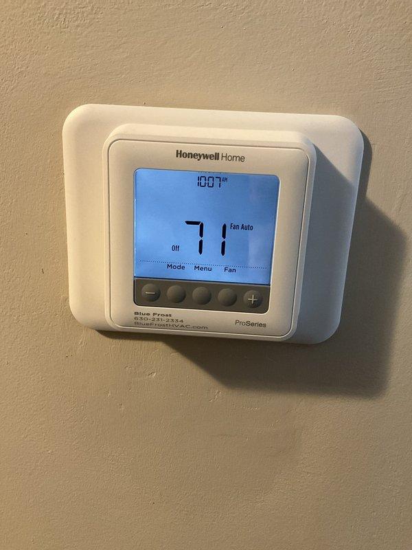 Completed comprehensive BFMA tune-up on 13-year-old air conditioning system, including inspection of electrical components, contactor, and control wiring within the unit's electrical panel. Verified proper thermostat operation and programming on Honeywell ProSeries digital control, confirming accurate temperature readings and system communication. All electrical connections were inspected for integrity, system tested for proper cycling, and unit found to be operating within normal parameters.