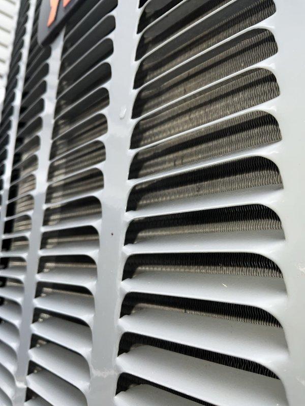 Completed comprehensive BFMA tune-up service on two air conditioning systems, both over four years old. Performed thorough inspection of evaporator coil assembly, noting dust and dirt accumulation on aluminum fins requiring attention for optimal heat transfer efficiency. Evaluated 16x25x1 MERV 8 air filter and documented system conditions through photographic records to ensure proper maintenance documentation and future reference.