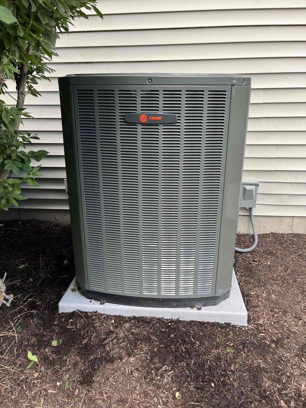 Completed comprehensive BFMA tune-up service on a Trane outdoor condensing unit with 10+ months of operation. Performed standard maintenance protocol including system inspection, coil cleaning to remove accumulated dust and debris from condenser fins, verification of electrical connections at disconnect box, and operational testing. Unit found in good overall condition with normal wear; all components functioning within manufacturer specifications upon service completion.