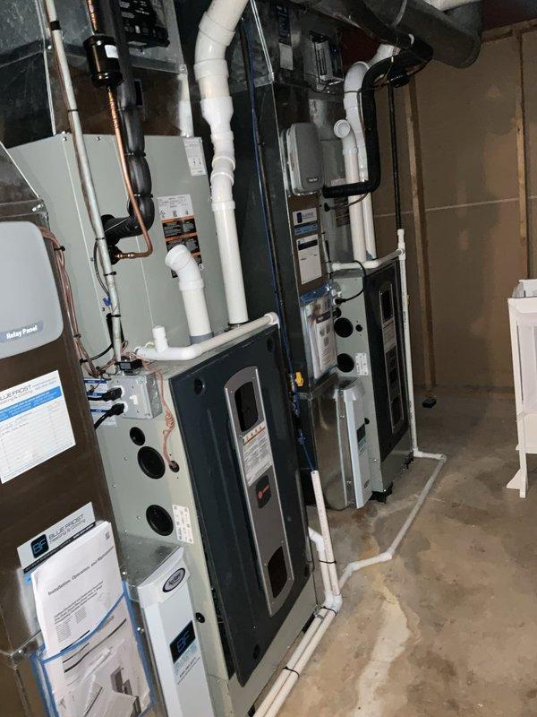 Completed comprehensive BFMA tune-up service on two air conditioning systems at residential property. Performed thorough inspection of both HVAC units located in basement mechanical room, including examination of blower wheel assembly, air handler components, and furnace system. Verified proper operation of blower motor, checked electrical connections, and inspected ductwork and ventilation systems. Assessed condition of filters, cleaned accessible components, and documented equipment age and operating status. All systems tested and confirmed to be functioning within normal parameters at time of service completion.