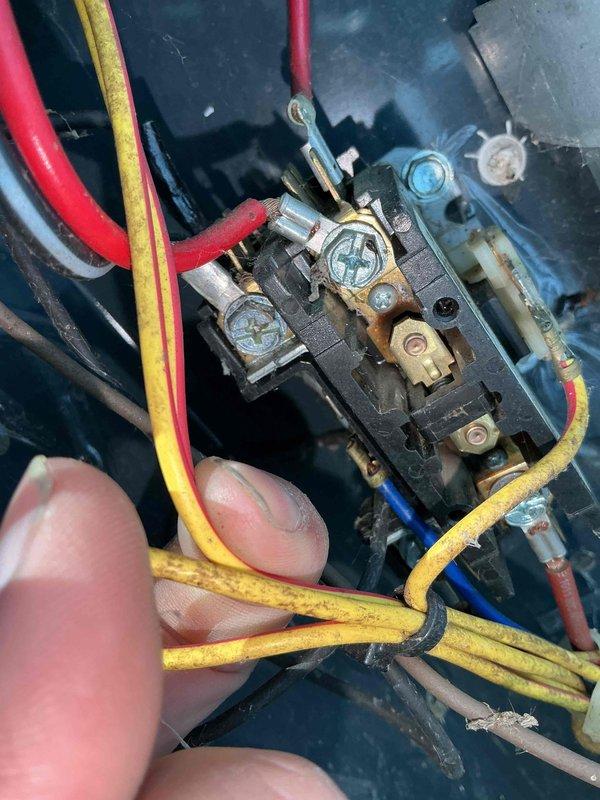 Completed comprehensive BFMA tune-up on 14-year-old air conditioning system. Inspected and tested electrical components including contactor with multiple wire connections showing age-related discoloration; all terminals secured and functional. Outdoor condenser unit required extensive cleaning due to heavy accumulation of dirt, debris, and organic material on coil fins and protective casing; removed buildup to restore proper airflow and heat transfer efficiency. Addressed damaged exterior panel and assessed overall system condition, noting corrosion on mounting hardware and framework consistent with equipment age and outdoor exposure.