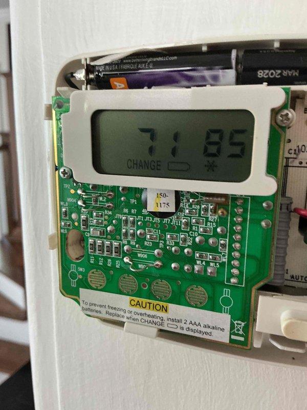 Completed comprehensive BFMA air conditioning tune-up on 4-year-old system per scheduled recurring maintenance program. Performed full system inspection, verified thermostat operation and calibration showing proper temperature reading of 72.6°F, and replaced thermostat batteries as indicated by low battery warning. All components tested and system operating within manufacturer specifications.