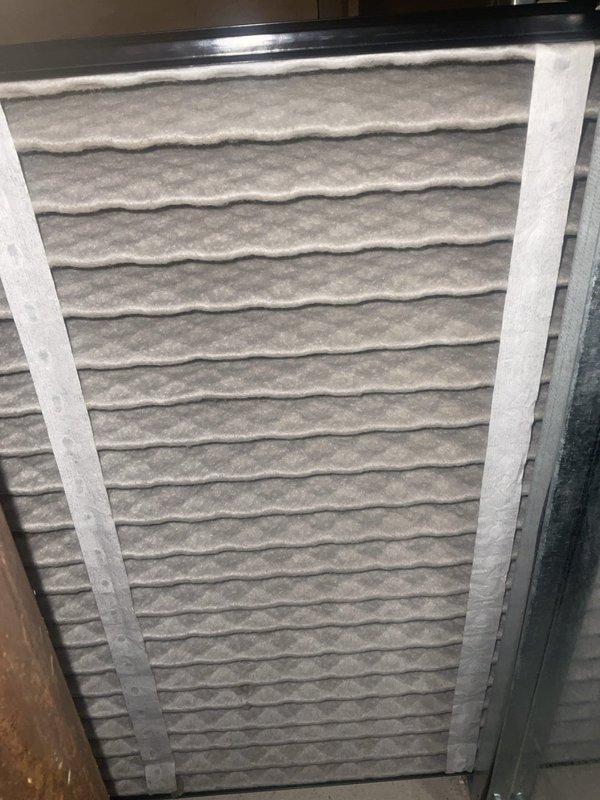 Performed comprehensive BFMA tune-up on Amana air conditioning system with equipment age of 4+ years. Inspected outdoor condensing unit, verified proper operation of all components, and documented existing air filter condition showing dust accumulation within pleated media. All system functions tested and confirmed operational per manufacturer specifications.