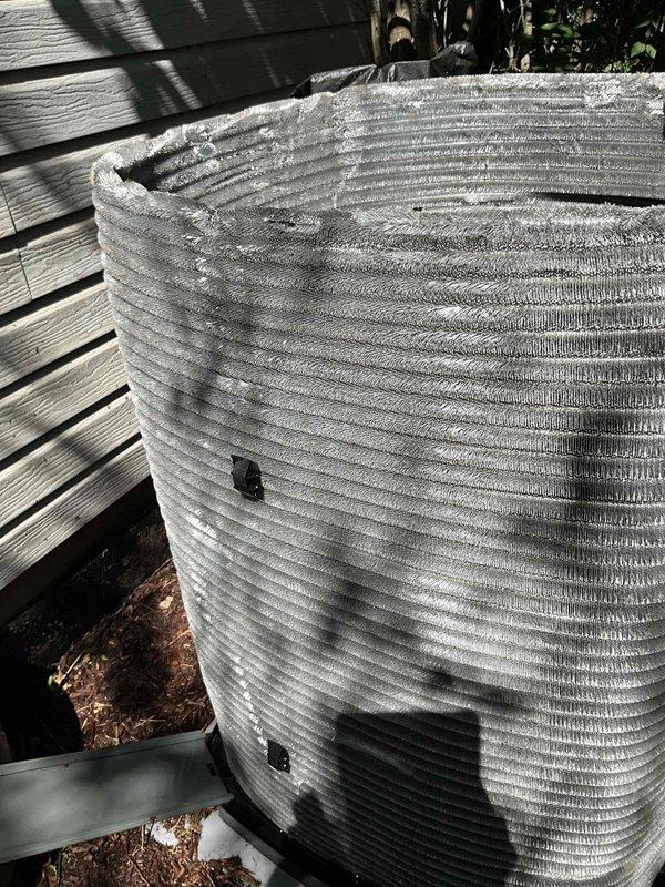 Completed comprehensive BFMA tune-up service on a 2+ year old outdoor air conditioning system. Performed full system inspection, cleaned condenser coils showing dirt accumulation and discoloration, checked refrigerant lines and electrical connections, verified proper operation of all components, and ensured unit was running at optimal efficiency. System is operating within normal parameters following maintenance completion.