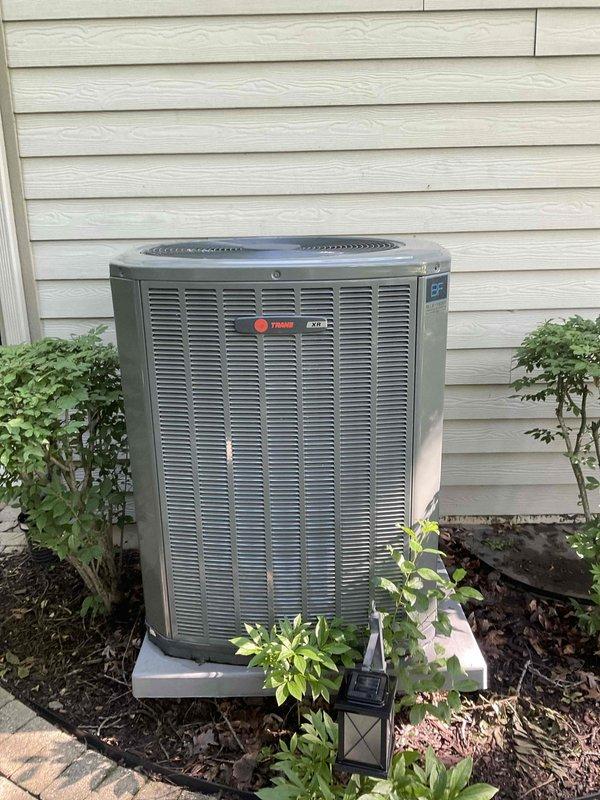 Completed comprehensive BFMA tune-up service on Trane XV series air conditioning unit, 3+ years old. Performed standard maintenance protocol including system inspection, filter evaluation, refrigerant level check, electrical connection testing, and condensate drain verification. Unit operating within manufacturer specifications; all components functioning properly with no issues identified during inspection.