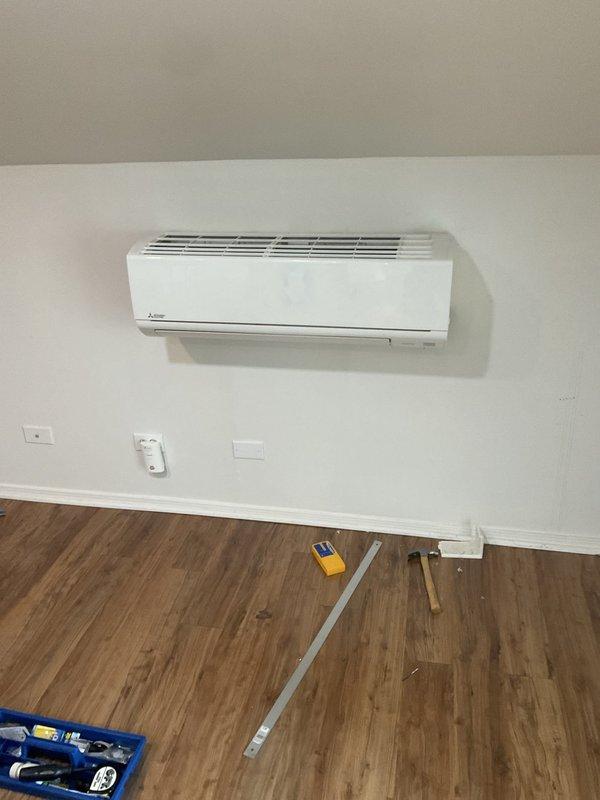 Responded to service call for reported heat pump leak in attic. Upon inspection, found Mitsubishi ductless mini-split system operating normally with no refrigerant leaks detected, no water leaks present, and no visible deficiencies noted. Unit functioning properly at time of service with all components operating within normal parameters. No trouble found during thorough inspection of indoor unit and surrounding area.