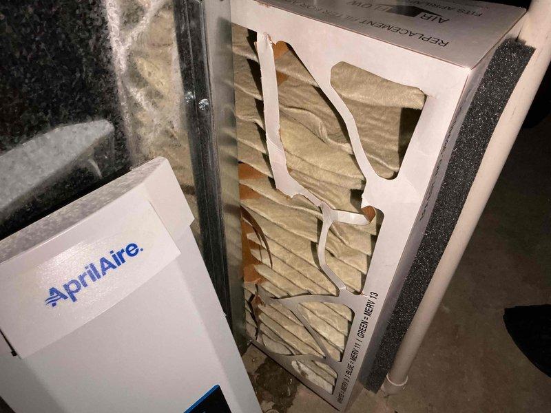 Completed comprehensive BFMA tune-up on 7+ year old air conditioning system. Performed standard maintenance protocol including system inspection, replaced dirty air filter with new AprilAire filter unit, inspected compressor and refrigerant lines for proper operation, and verified all components functioning within normal parameters. Unit tested and left in proper working condition with improved airflow efficiency.