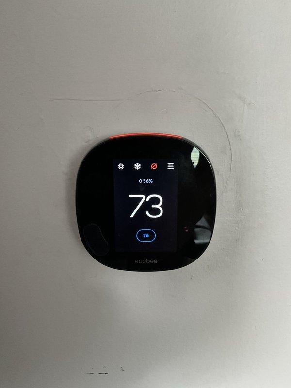 Completed comprehensive BFMA tune-up on 10+ year old air conditioning system during morning service window. Performed full system inspection including thermostat verification (Ecobee unit displaying 73°F with 76°F setpoint), evaluated outdoor condensing unit with focus on coil condition and electrical components including capacitor inspection. All standard preventive maintenance procedures completed per BFMA protocol to ensure optimal system performance for cooling season.