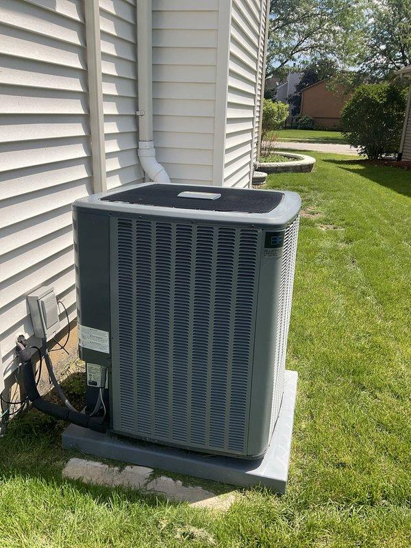 Completed comprehensive BFMA tune-up service on residential HVAC system including air conditioning unit inspection and maintenance, water heater evaluation, and air filter replacement. Outdoor condensing unit showed good operational condition with no visible damage; unit operating within normal parameters. Replaced heavily soiled pleated air filter which exhibited significant dust and debris accumulation, restoring proper airflow to system. Provided estimate for hard start kit installation per customer request to improve compressor performance and extend equipment lifespan.