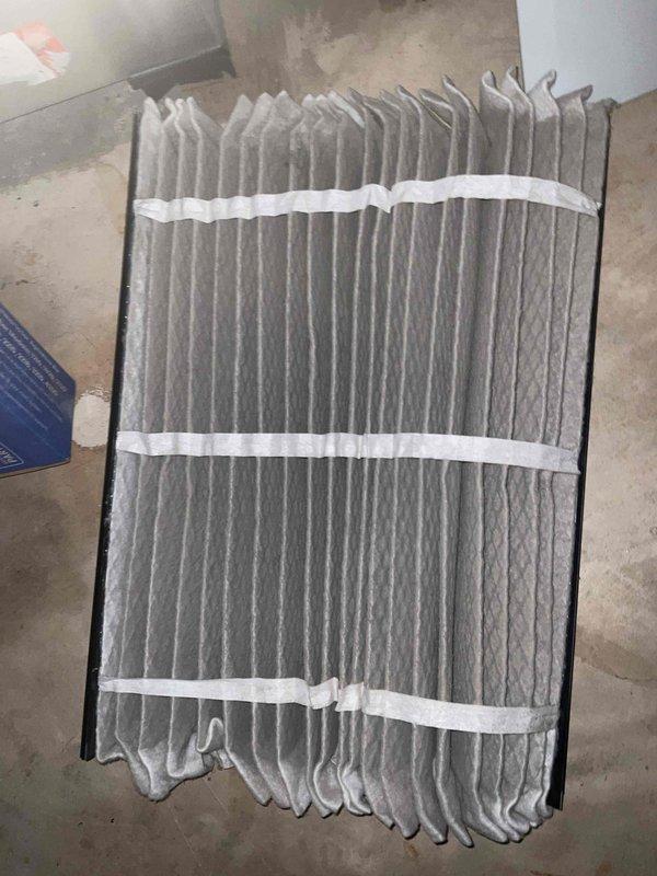 Completed comprehensive BFMA tune-up service on residential HVAC system including air conditioning unit inspection and maintenance, water heater evaluation, and air filter replacement. Outdoor condensing unit showed good operational condition with no visible damage; unit operating within normal parameters. Replaced heavily soiled pleated air filter which exhibited significant dust and debris accumulation, restoring proper airflow to system. Provided estimate for hard start kit installation per customer request to improve compressor performance and extend equipment lifespan.