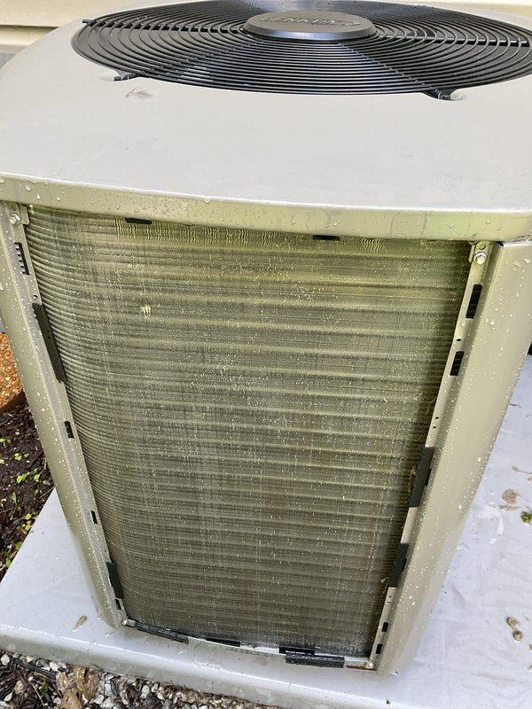 Completed comprehensive BFMA tune-up on a 5-month-old air conditioning system. Performed inspection of outdoor condenser unit, noting significant accumulation of dirt, dust, pollen, and organic debris on coil surfaces requiring cleaning to restore proper airflow and system efficiency. Replaced dirty air filter at indoor unit to improve air quality and system performance.