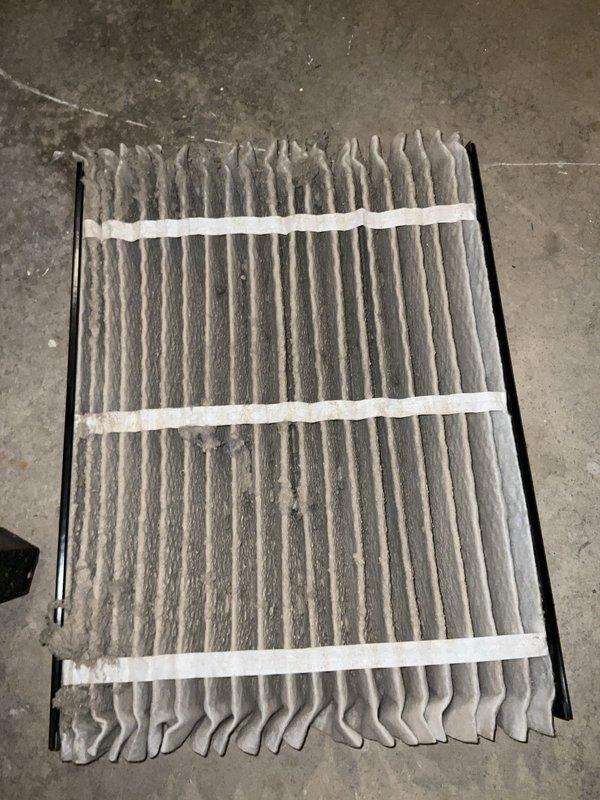 Completed comprehensive BFMA tune-up on 13-year-old air conditioning system. Performed thorough inspection of condenser unit, noting coils were clean and in excellent working condition with no debris accumulation or fin damage. Replaced heavily soiled air filter that had accumulated significant particulate matter, restoring proper airflow to the system.