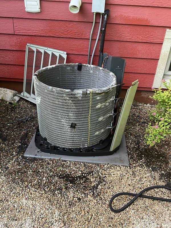 Completed comprehensive BFMA air conditioning tune-up service on residential split system. Inspected and documented outdoor condenser unit showing moderate accumulation of debris and organic growth on coil fins; evaluated indoor air filter which exhibited significant dust loading and particulate buildup requiring attention. Performed standard preventative maintenance procedures including system operational checks, refrigerant line inspection, and electrical connection verification to ensure optimal cooling performance for the upcoming season.