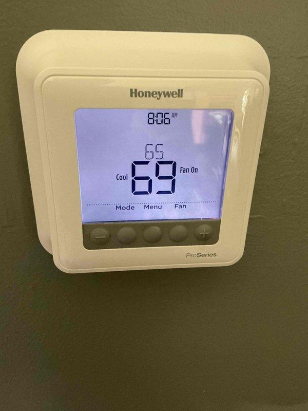 Completed comprehensive BFMA tune-up on 2017 Trane XR model 4TTR4030H1000HA air conditioning system. Performed full system inspection, verified proper operation of outdoor condensing unit, checked electrical specifications and voltage ratings, inspected condenser coil condition, and confirmed Honeywell ProSeries thermostat functionality with system cooling at 65 degrees and fan operation normal.