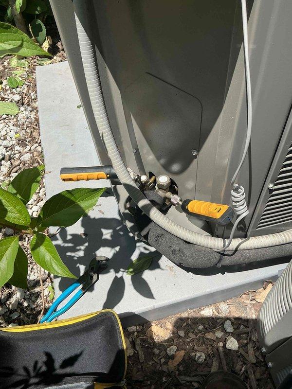 Completed comprehensive BFMA tune-up service on residential heat pump system aged 2+ years, including full AC maintenance and dryer vent cleaning. Connected refrigerant gauges to service ports and performed system diagnostics, measuring electrical current draw at 73.1 amps using clamp meter to verify compressor performance and overall system operation. Conducted standard preventative maintenance procedures, confirmed proper refrigerant levels, inspected electrical connections, and cleaned dryer vent system as requested per non-membership service agreement.