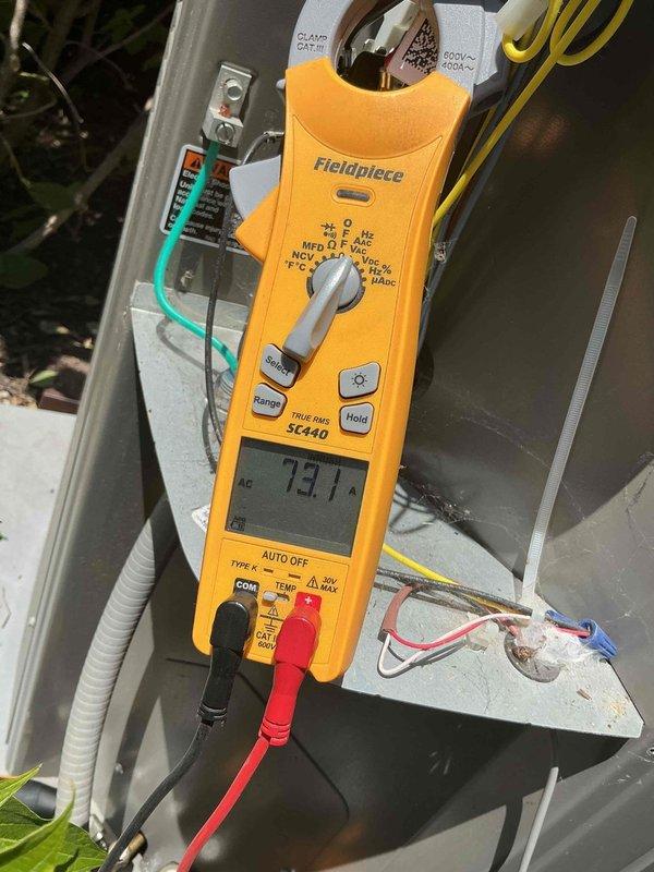 Completed comprehensive BFMA tune-up service on residential heat pump system aged 2+ years, including full AC maintenance and dryer vent cleaning. Connected refrigerant gauges to service ports and performed system diagnostics, measuring electrical current draw at 73.1 amps using clamp meter to verify compressor performance and overall system operation. Conducted standard preventative maintenance procedures, confirmed proper refrigerant levels, inspected electrical connections, and cleaned dryer vent system as requested per non-membership service agreement.