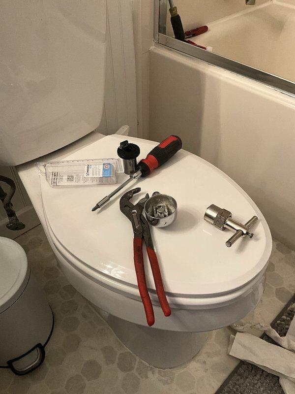 Shut off main water supply to residence and systematically drained entire plumbing system in preparation for shower/tub fixture service. Utilized pipe wrench and hand tools to access shut-off valves and ensure complete water evacuation from supply lines, preventing water damage during repair work.