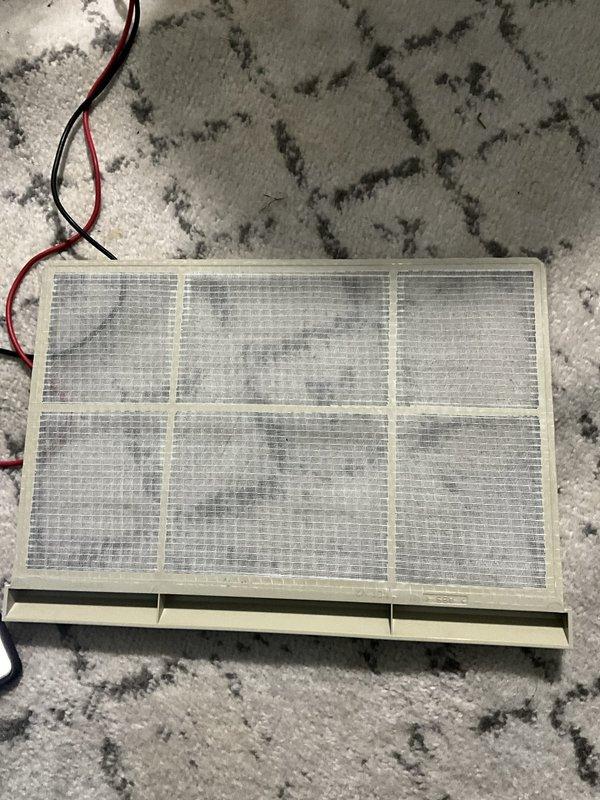 Responded to a no cooling call for wall-mounted mini-split units in a residential property. Upon inspection, found the indoor evaporator coil heavily contaminated with dust and debris accumulation across the fins, significantly restricting airflow and heat transfer capability. Removed and cleaned the evaporator coil assembly, restoring proper air circulation and cooling performance to the system.