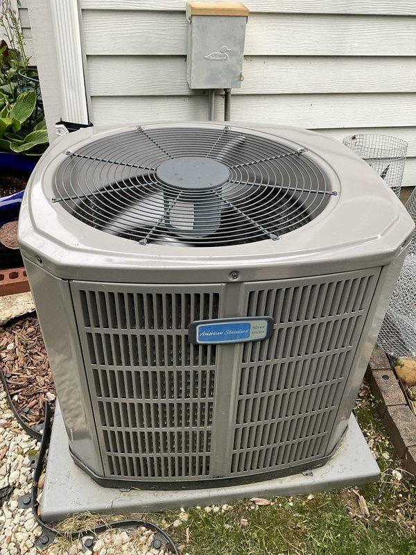 Completed comprehensive BFMA tune-up on American Standard split system air conditioning unit (4+ years old). Performed complete inspection of outdoor condensing unit and indoor evaporator coil assembly located in attic space, verified proper operation of compressor and condenser fan motor, checked refrigerant lines for leaks and proper insulation, inspected aluminum fin condition on both coil assemblies, tested electrical connections at disconnect box, and confirmed system functionality. All components found operating within normal parameters with no immediate service needs identified.