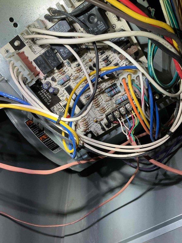 Completed comprehensive BFMA tune-up on 8+ year old air conditioning system, arriving after 11AM per customer preference. Performed full system inspection including electrical control panel examination, verified all wire connections and contactors, inspected outdoor condenser unit, and removed accumulated organic debris (leaves and twigs) from condenser housing and surrounding area. All components tested and operating within normal parameters upon completion.