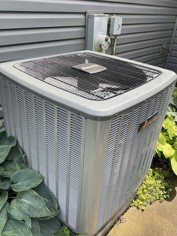 Completed comprehensive air conditioning tune-up on outdoor condenser unit, including system inspection, performance testing, and filter evaluation. Unit found in normal operating condition with standard weathering; all components functioning properly and system ready for continued seasonal use.