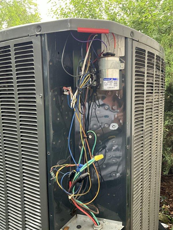 Responded to service call for residential air conditioning unit not cooling properly since previous service visit. Unit thermostat was set to 63°F but indoor temperature measured 73°F, indicating a 10-degree differential and failure to maintain setpoint. Performed comprehensive diagnostic inspection of outdoor condenser unit, accessing internal components to evaluate system operation. Inspected compressor, capacitor, electrical connections, and wiring throughout the unit. Verified proper voltage supply and examined all electrical terminations for secure connections. Assessed refrigerant system components and overall unit functionality to identify root cause of cooling failure and provide fresh perspective on system issues.