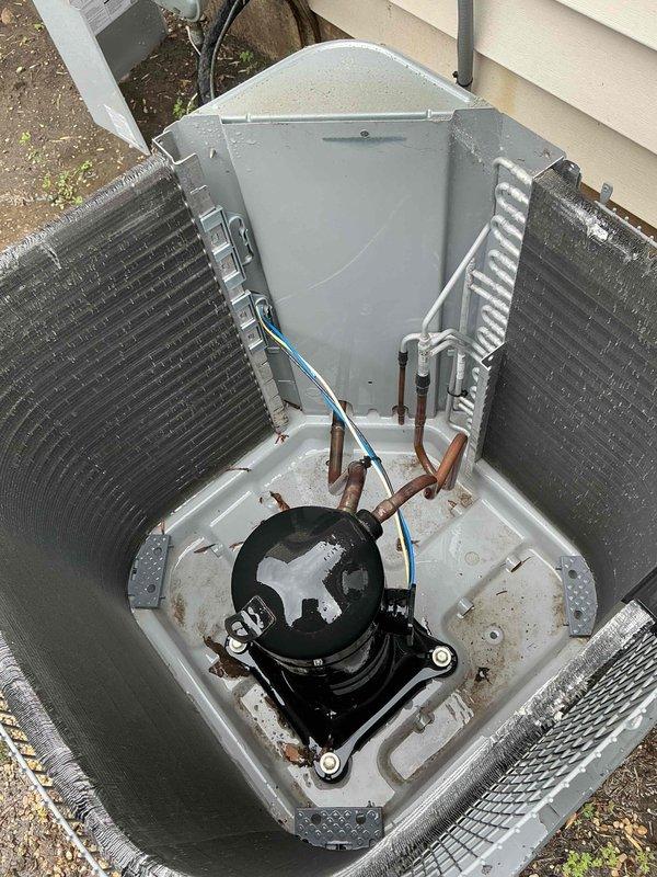 Completed comprehensive BFMA tune-up service on a 5+ year old Carrier split-system air conditioning unit during afternoon appointment window. Performed standard preventive maintenance procedures including visual inspection of outdoor condensing unit, verified compressor operation, examined condenser coil condition and refrigerant line connections, and assessed overall system components for proper function and wear. Unit operational with no immediate deficiencies noted; documented equipment condition with photographic records for service history.