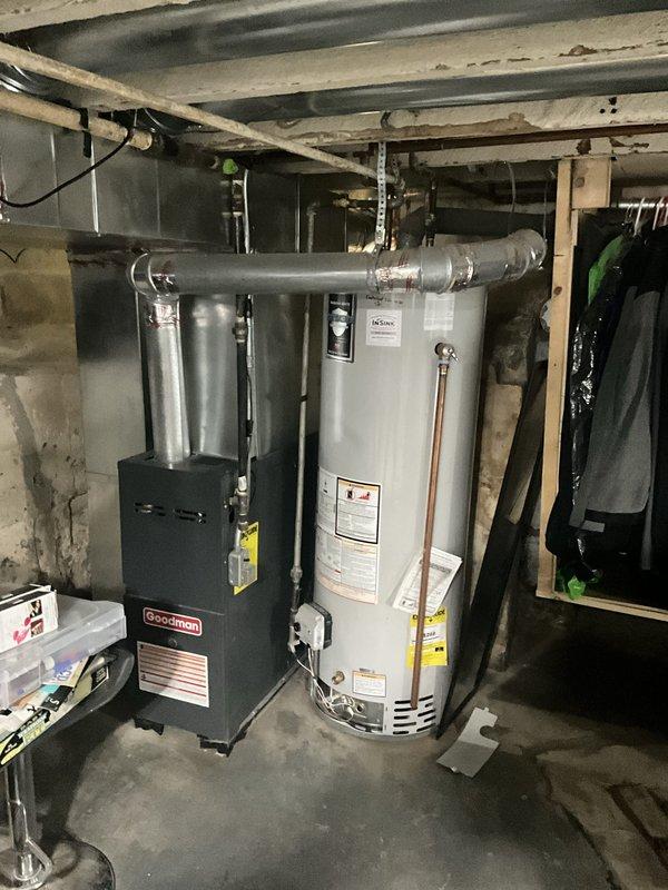 Responded to service call for water heater with pilot light that would not remain lit. Upon arrival, inspected tanked water heater unit located in basement utility area adjacent to furnace system. Diagnosed pilot assembly malfunction preventing consistent flame retention. Replaced faulty thermocouple, cleaned pilot orifice, and tested gas valve operation to restore proper pilot light function and ensure safe water heater operation.