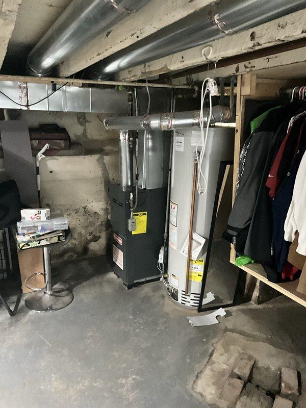Responded to service call for water heater with pilot light that would not remain lit. Upon arrival, inspected tanked water heater unit located in basement utility area adjacent to furnace system. Diagnosed pilot assembly malfunction preventing consistent flame retention. Replaced faulty thermocouple, cleaned pilot orifice, and tested gas valve operation to restore proper pilot light function and ensure safe water heater operation.