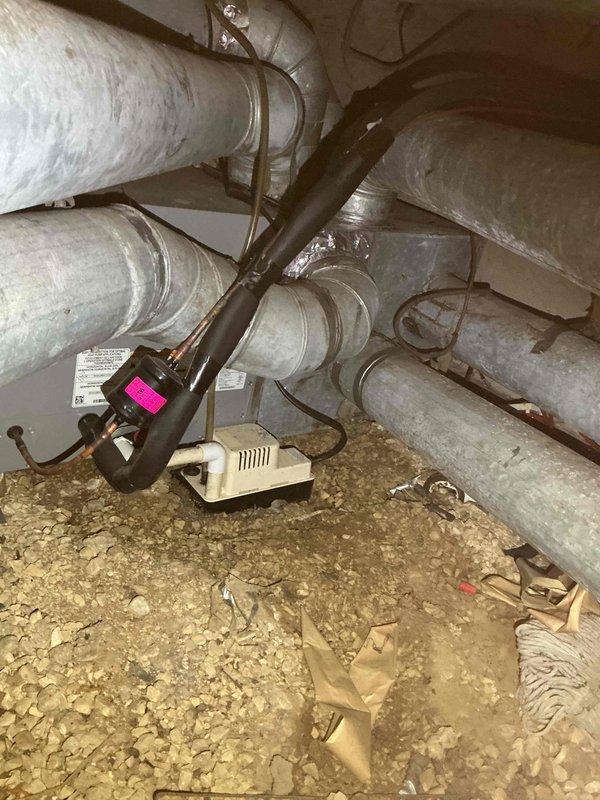 Completed comprehensive BFMA tune-up service on 10+ year old residential air conditioning system during afternoon appointment window. Performed standard maintenance procedures on outdoor condenser unit including inspection of electrical disconnect, refrigerant lines, and conduit connections. Inspected indoor air handler components in crawl space, evaluating ductwork insulation condition, condensate pump operation, and verifying proper system airflow throughout the mechanical installation.