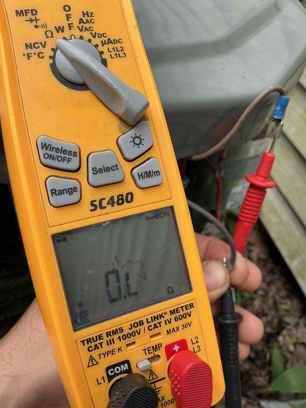 Completed comprehensive BFMA tune-up on 21-year-old air conditioning system. Performed thorough inspection and testing of outdoor condensing unit, which showed significant dust and debris accumulation on compressor motor and condenser coils due to age and environmental exposure. Conducted electrical diagnostics using digital multimeter to verify system performance, checked voltage readings, and confirmed proper operation of all major components despite visible weathering on unit housing and mounting brackets.
