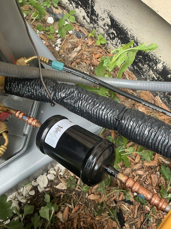 Completed full HVAC system replacement installing Lennox EL297UH09036CK furnace, ML 13KC1-048 condenser, and CK40CT-48C-71 coil in residential basement mechanical room. Removed existing 17.5" furnace and installed new 21" unit, accommodating size difference while maintaining proper clearances and connections. Reused existing 1" filter rack and reinstalled humidifier, thermostat, and outdoor humidity sensor from previous system.

Established all refrigerant line connections with proper insulation and fittings, installed new filter-drier in outdoor refrigerant circuit. Replaced outdoor whip and outdoor humidity sensor while retaining existing disconnect. Connected white PVC condensate piping with appropriate drainage routing. Verified proper ductwork connections to new furnace cabinet and secured all galvanized supply and return plenum attachments.

Completed all electrical connections including thermostat wiring, humidifier power, and outdoor unit hookup with 40A 2-pole breaker protecti
