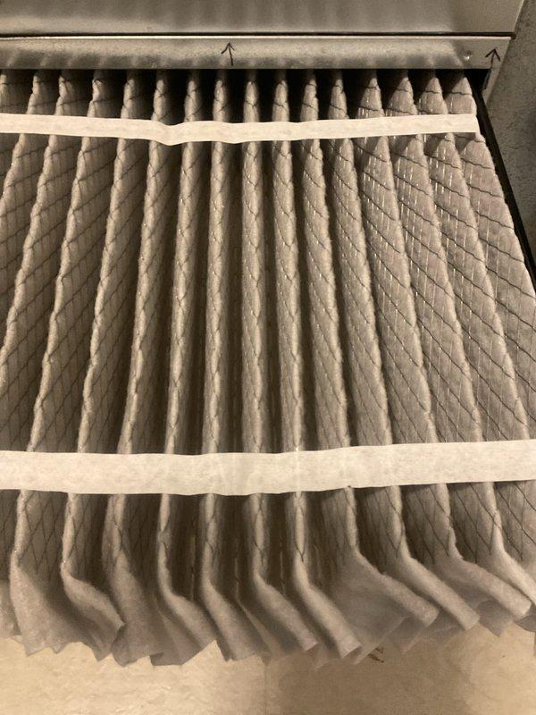 Completed comprehensive BFMA tune-up on 12-year-old residential air conditioning system. Performed standard preventive maintenance including inspection of outdoor condenser unit, verified proper airflow through pleated air filter, and assessed overall system operation. Noted vegetation overgrowth around condenser unit requiring clearance for optimal performance, and provided estimate for mini-split refrigerant recharge as requested by homeowner.