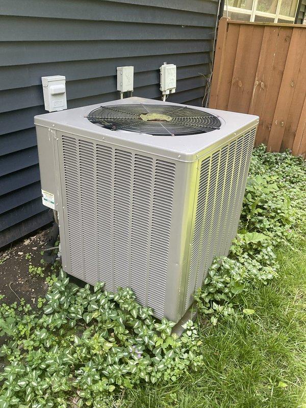 Completed comprehensive BFMA tune-up on 12-year-old residential air conditioning system. Performed standard preventive maintenance including inspection of outdoor condenser unit, verified proper airflow through pleated air filter, and assessed overall system operation. Noted vegetation overgrowth around condenser unit requiring clearance for optimal performance, and provided estimate for mini-split refrigerant recharge as requested by homeowner.