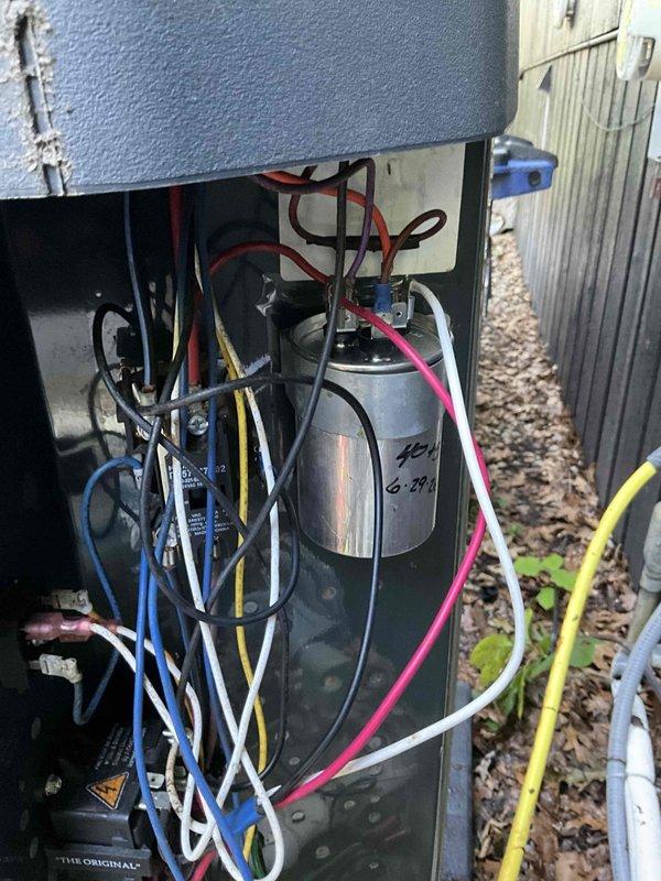 Completed comprehensive BFMA tune-up on 7+ year old air conditioning system during morning service window. Upon arrival, found outdoor condenser unit coils heavily clogged with debris, dust, and organic material causing significant airflow restriction and reduced system efficiency. Thoroughly cleaned condenser coils to restore proper airflow and heat transfer capability. Inspected electrical components within condenser compartment including capacitor and associated wiring connections. Verified all electrical connections were secure and capacitor showed proper markings and functionality. System restored to optimal operating condition with improved efficiency following coil cleaning and complete tune-up procedures.
