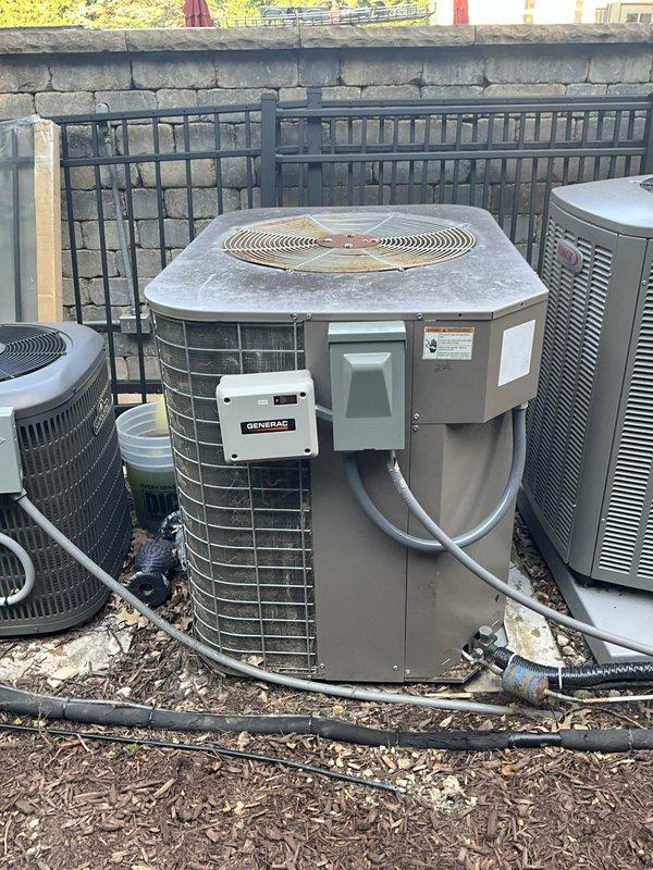 Responded to no cooling complaint on second and third floors with thermostat set to 65°F but showing 78°F and 80°F respectively. Upon arrival, found multiple outdoor condensing units installed on rooftop area. Performed diagnostic evaluation of the multi-zone HVAC system to identify cause of inadequate cooling in upper levels and documented equipment conditions with photos for service records.