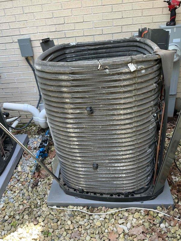 Completed comprehensive BFMA tune-up service on two air conditioning systems, including inspection of garage mini-split unit. Performed filter replacement on heavily soiled air filter showing significant dust and debris accumulation. Conducted thorough maintenance on outdoor condenser unit, addressing substantial dirt and debris buildup on coil fins that was restricting airflow and reducing system efficiency. Cleaned condenser coils, inspected refrigerant lines, verified electrical connections at disconnect box, and ensured proper system operation. All equipment tested and operating within normal parameters upon completion of semi-annual maintenance service.