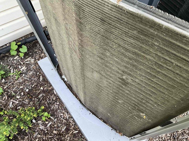 Completed comprehensive BFMA tune-up service on residential HVAC system. Inspected and assessed blower wheel assembly, confirming proper operation of centrifugal fan and blade configuration. Evaluated outdoor condenser unit, noting significant accumulation of dirt, dust, and pollen on heat exchanger fins requiring attention. Addressed thermostat concerns as requested, performed standard maintenance checks, and documented equipment condition with photographic evidence. System operational upon completion of service visit.
