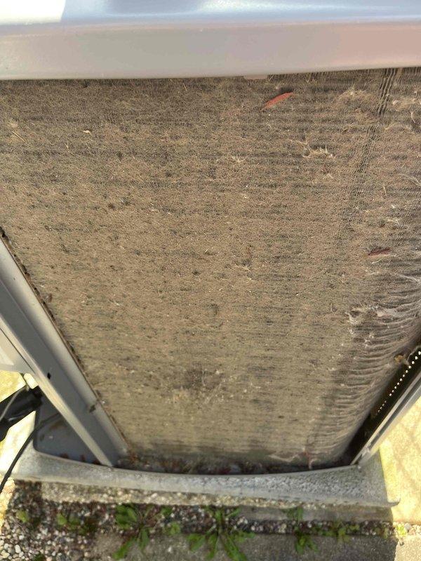 Completed comprehensive BFMA tune-up service on residential air conditioning system. Performed thorough inspection of outdoor condenser unit, which revealed significant dirt and debris accumulation within the fin coil assembly requiring cleaning. Replaced heavily soiled air filter that showed extensive dust buildup and restricted airflow capacity. Conducted full system evaluation including operational testing, temperature differential measurements, and refrigerant level verification. Cleaned condenser coils to restore optimal heat transfer efficiency and ensure proper system performance. All components operating within manufacturer specifications upon completion of maintenance service.