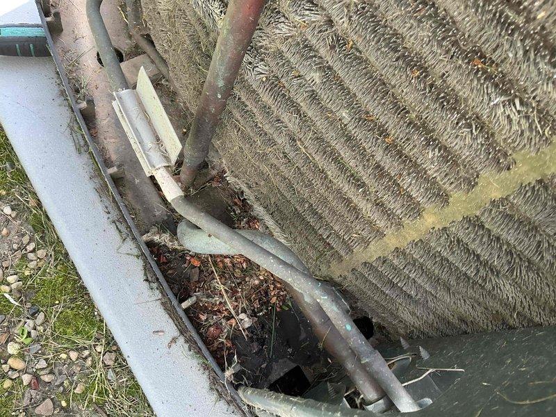 Completed comprehensive BFMA tune-up on 8-year-old outdoor condensing unit. Performed standard maintenance protocol including inspection of condenser coil which showed moderate debris accumulation and weathering, cleaned base pan area of leaves and organic material, and inspected condenser fan motor assembly with cooling fins. Unit operational upon completion with all components functioning within normal parameters.