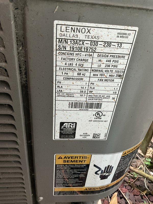 Responded to no cooling call on Lennox 13ACX-030 residential air conditioning system. Upon arrival, inspected outdoor condenser unit and verified unit specifications. System appeared to be in operational condition with no visible damage to exterior components or electrical connections. Condenser unit showed normal wear consistent with age but remained structurally sound. Cleared debris and leaves from base of unit to ensure proper airflow. Further diagnostics would be required at thermostat and indoor air handler to determine root cause of no cooling complaint and verify whether thermostat replacement is necessary or if issue lies elsewhere in the system.