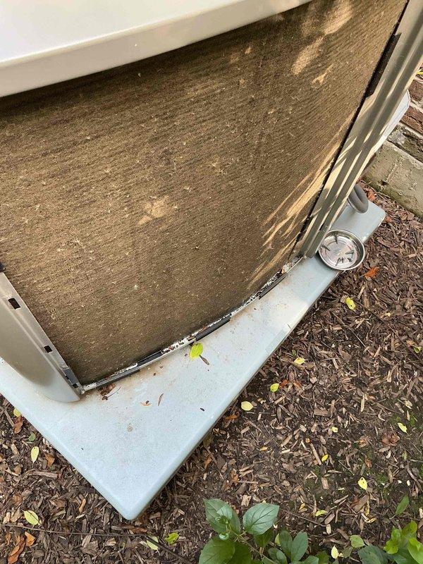 Completed comprehensive BFMA tune-up on residential air conditioning system. Upon arrival, discovered exterior filter screen heavily contaminated with organic debris, algae buildup, and significant dirt accumulation restricting airflow. Thoroughly cleaned and serviced filter assembly, removing all debris from mesh screen and housing frame. Inspected condenser unit, verified proper operation of all components, and ensured system is operating within manufacturer specifications for optimal cooling performance.